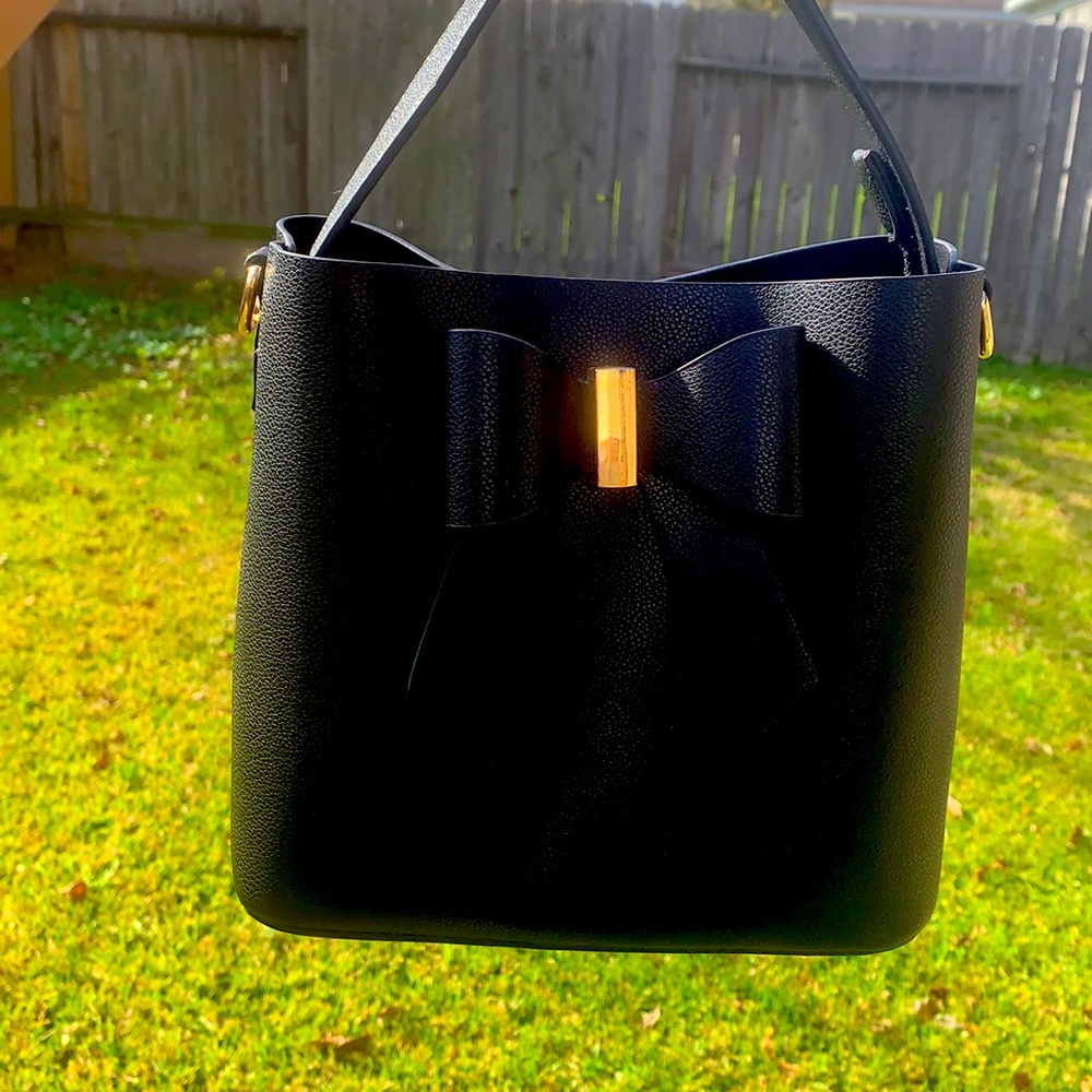 Black (w/ gold ascents) bow purse